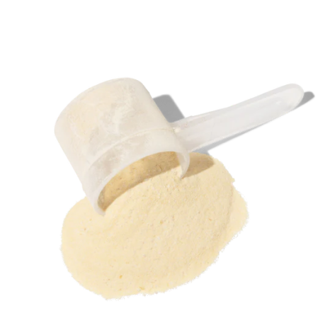 Scoop of PectaSol powder beside a pile of powder