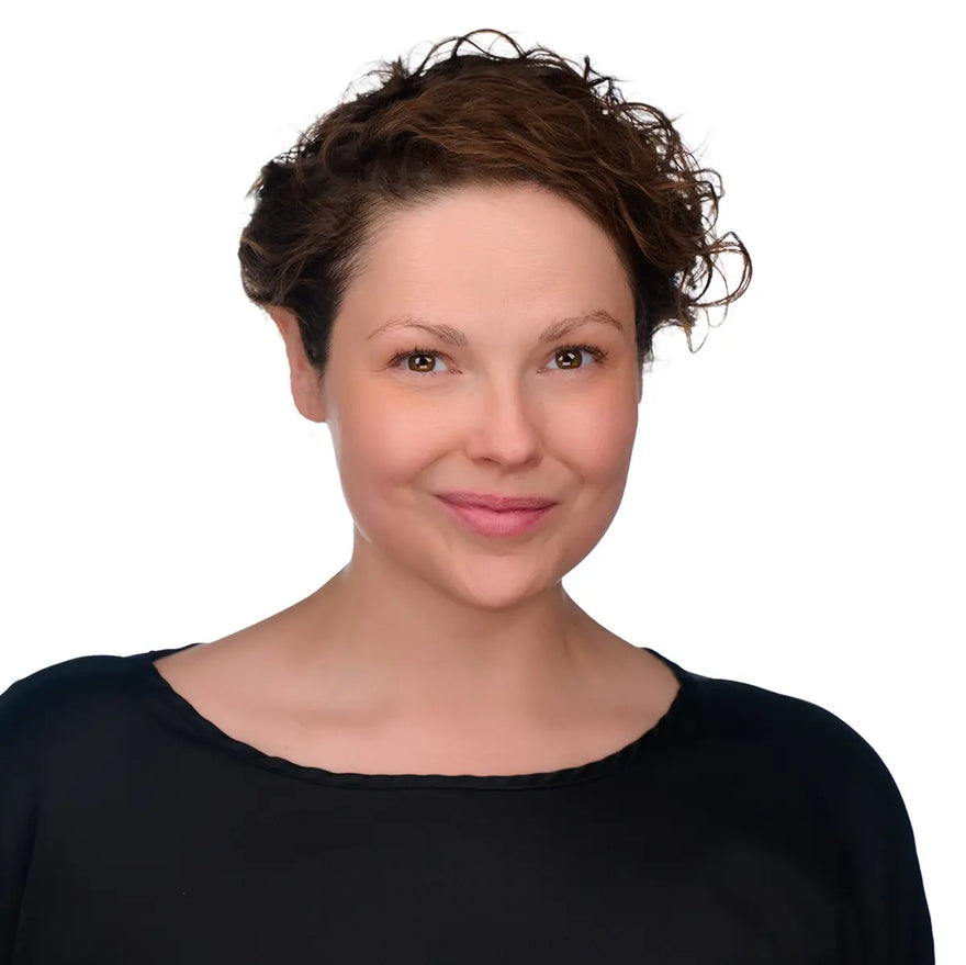 Dr Lauren Tessier wearing a black top on a white background