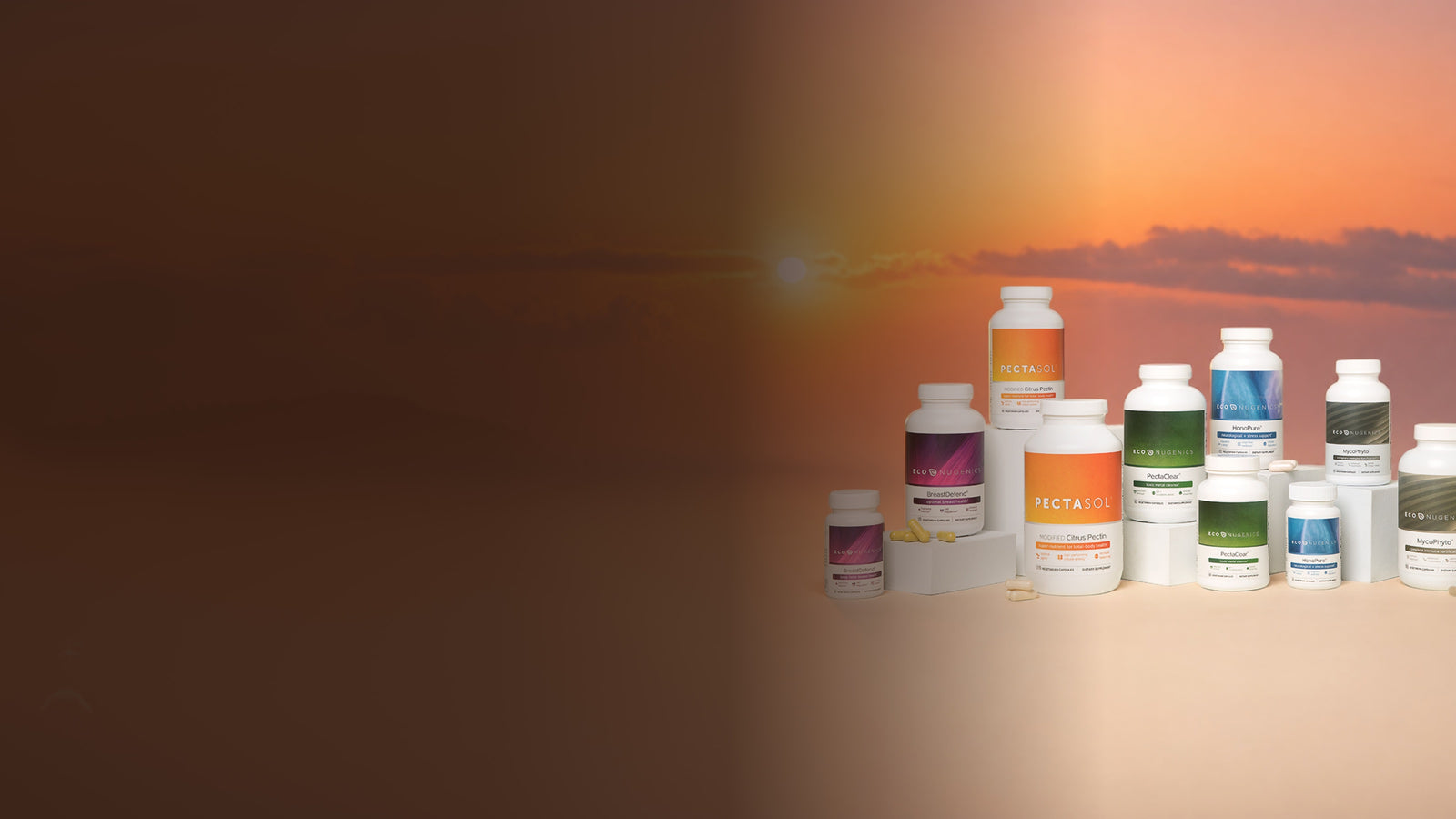 The ecoNugenics supplement range against a summer sunset sky