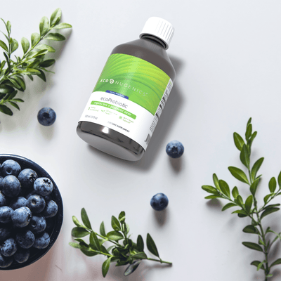 ecoProbiotic bottle on side with berries